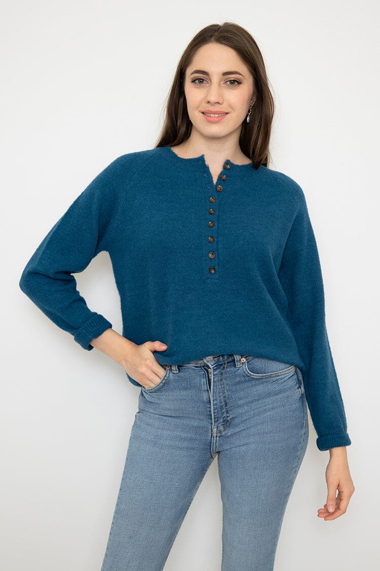 Pull avec bouton pull