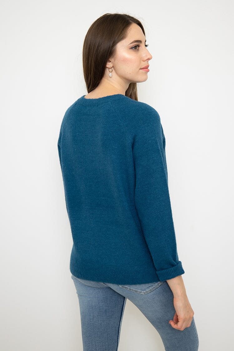 Pull avec bouton pull